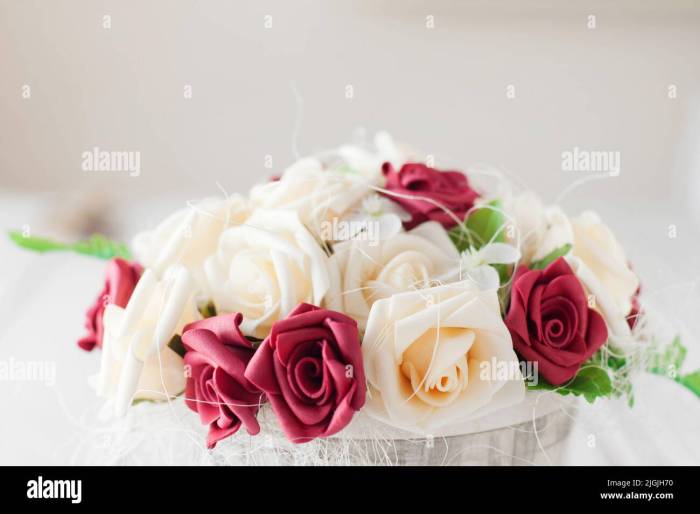 White wedding dress with red roses